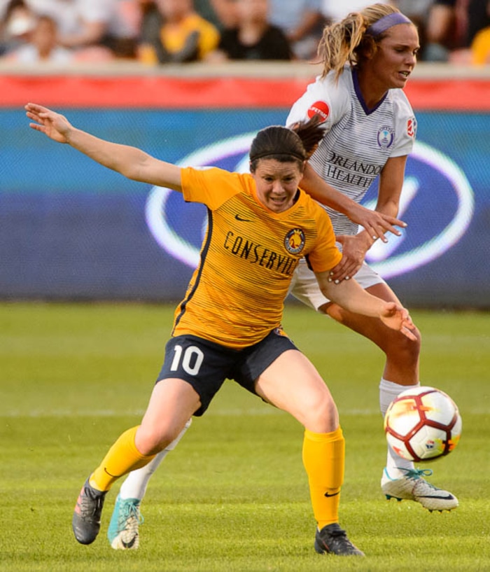 (Trent Nelson | The Salt Lake Tribune)  Utah Royals host Orlando Pride at Rio Tinto Stadium in Sandy, Wednesday May 9, 2018. Utah Royals FC midfielder Diana Matheson (10) and Orlando Pride midfielder Dani Weatherholt (17).
