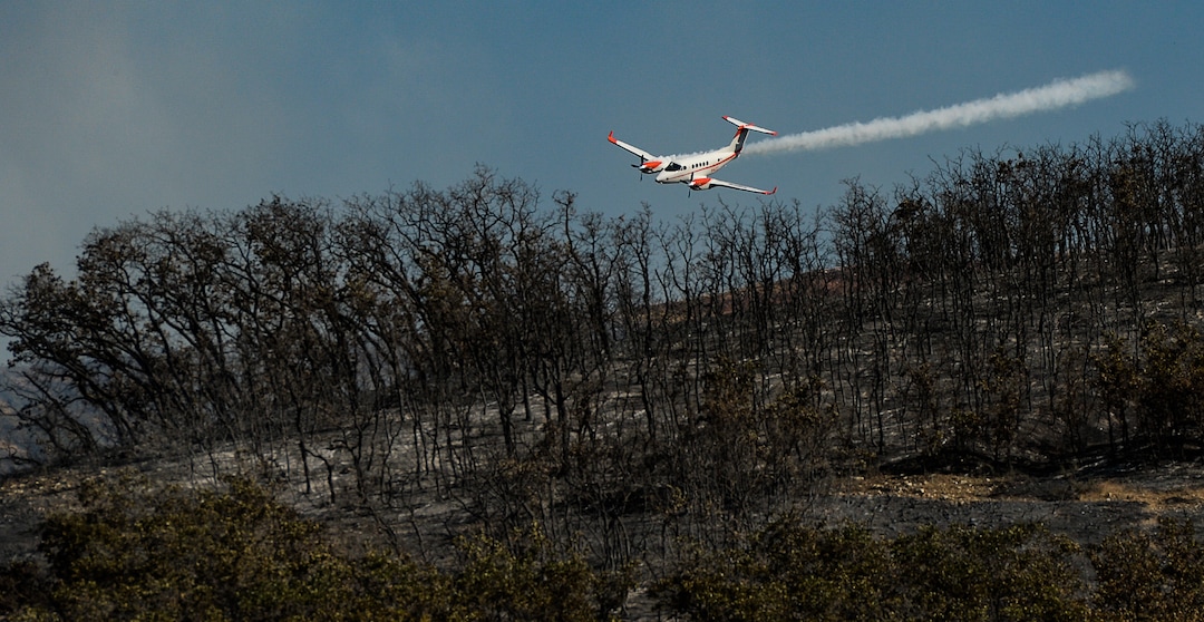 (Francisco Kjolseth  |  The Salt Lake Tribune)  Air crews battle the fire along the East Bountiful bench that grew to 150 acres early Friday morning, Aug. 30, 2019, and destroyed three homes. On Sept. 2, officials said the fire was 100% contained.