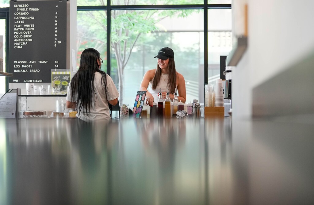 (Francisco Kjolseth | The Salt Lake Tribune) Hannah Hoffman takes a customer's order at JJ Coffee Co. in downtown Salt Lake City on Tuesday, June 23, 2026.