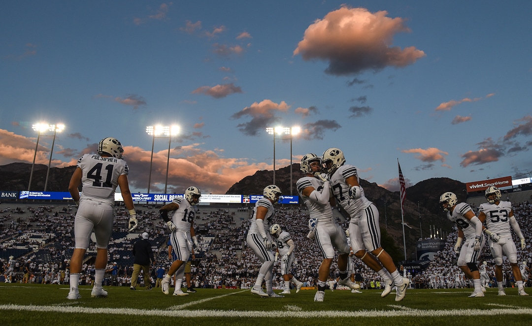 (Francisco Kjolseth  |  The Salt Lake Tribune)   The BYU Cougars take to the field to warm up before their game against the California Golden Bears for their NCAA college football game, Saturday, Sept. 8, 2018, at LaVell Edwards stadium in Provo, Utah.