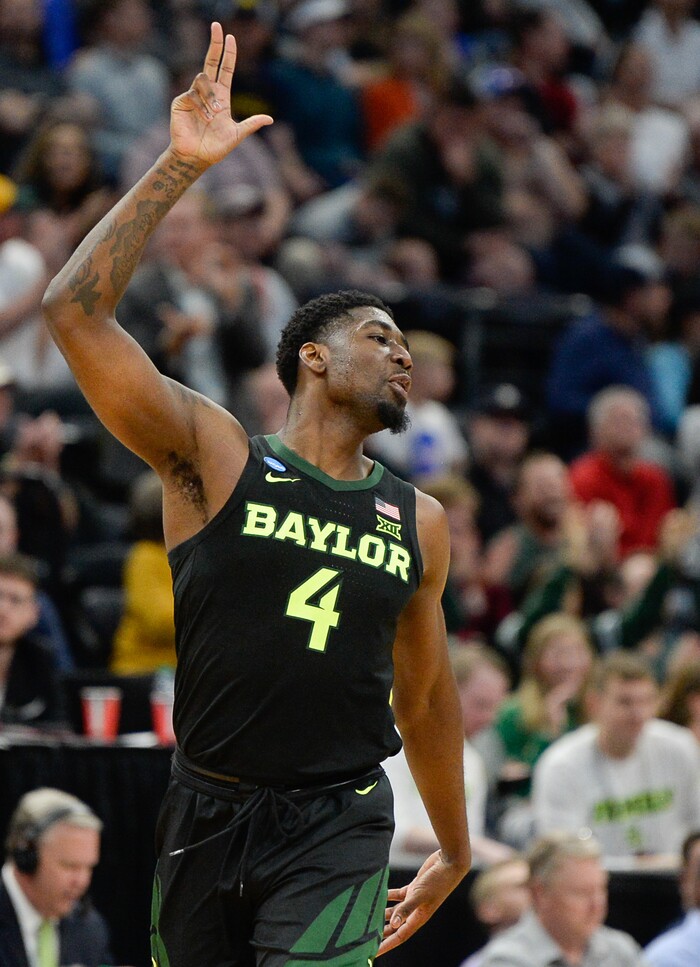 (Francisco Kjolseth  |  The Salt Lake Tribune)  Baylor Bears guard Mario Kegler (4) celebrates a three pointer as Syracuse faces Baylor in their first round menÕs NCAA March Madness tournament game at Vivint Smart Home Arena in Salt Lake City on Thursday, March 21, 2019.