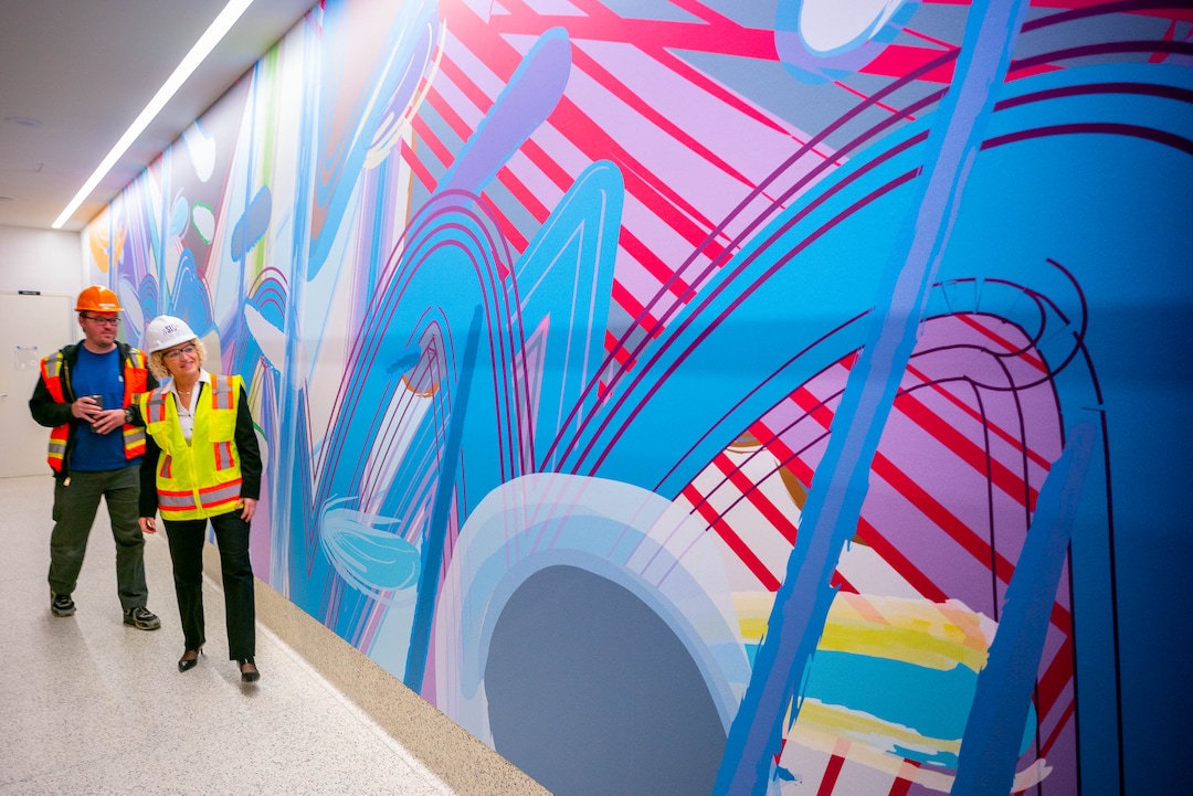 (Trent Nelson  |  The Salt Lake Tribune)
Artist Trent Call and Salt Lake City Mayor Jackie Biskupski look over Call's artwork "Lake Bonneville," following a news conference showcasing the art by 18 local and national artists chosen to be featured in the new Salt Lake City airport as the Whimsy Wall Art Project, on Friday, Nov. 1, 2019.