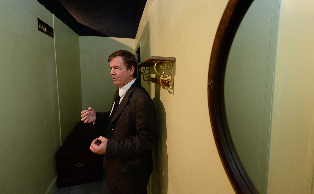 (Francisco Kjolseth  |  The Salt Lake Tribune)  Les Pardew, owner of the Mystery Escape Room at The Gateway gives a tour of the re-created rooms from "Downton Abbey" for its latest attraction.