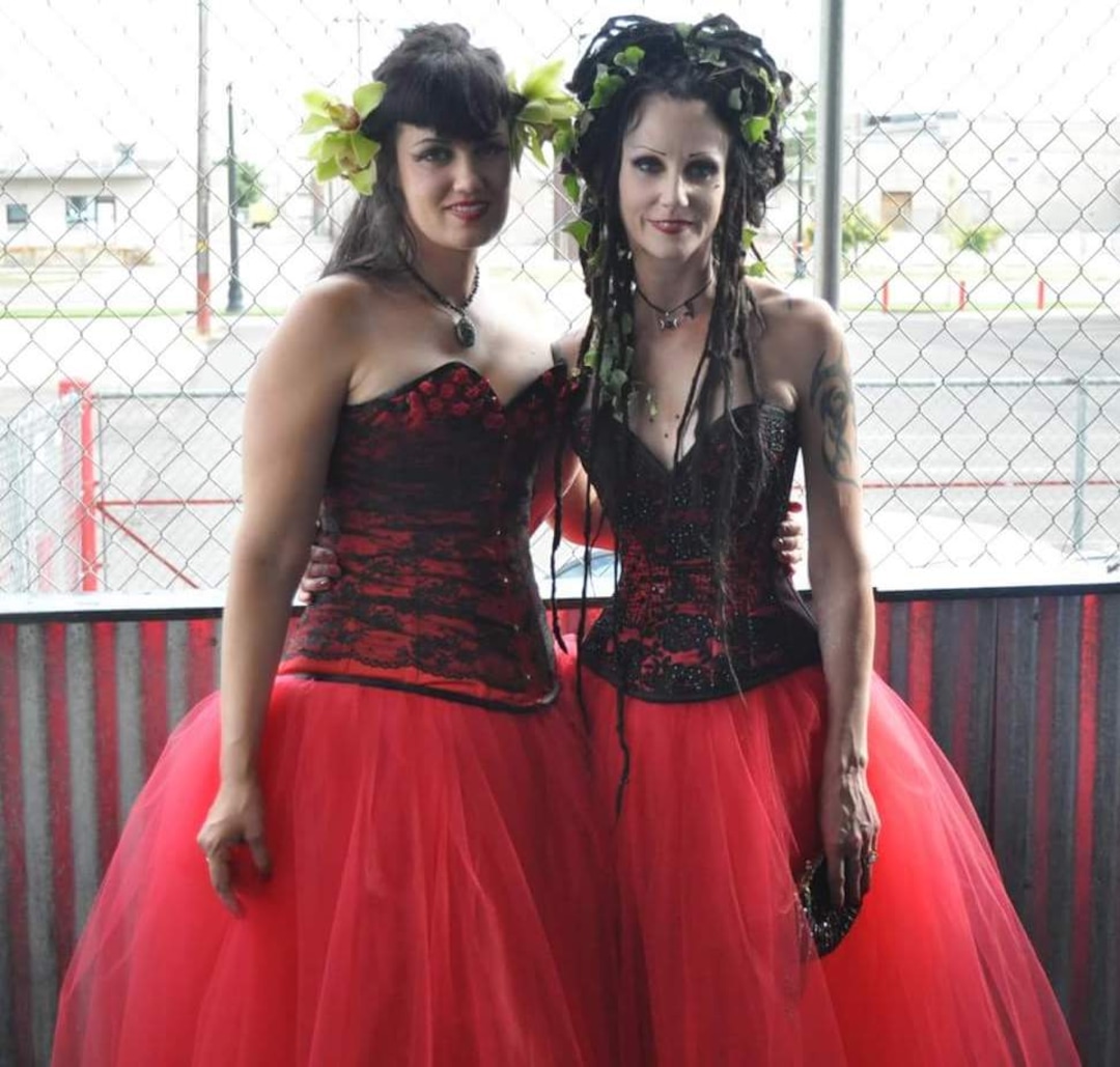 (Courtesy photo) Megan Dinnell (aka Olivia Megsysi) and Cinamon Hadley at their wedding reception on Dec. 20, 2013.