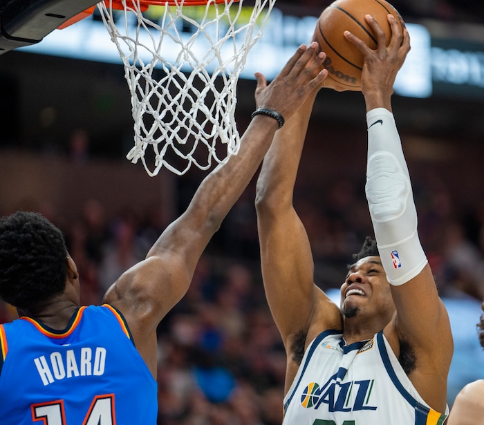 (Rick Egan | The Salt Lake Tribune) Utah Jazz center Hassan Whiteside (21) shoots as Oklahoma City Thunder forward, Jaylen Hoard (14),  in NBA action between the Utah Jazz and the Oklahoma City Thunder at Vivint Arena, on Wednesday, April 6, 2022.
