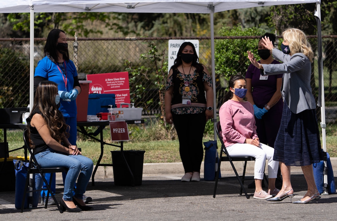 (Francisco Kjolseth | The Salt Lake Tribune) First lady Jill Biden cheers health care workers and those willing to be vaccinated as she,visits a pop-up COVID-19 vaccine clinic in Jordan Park on Salt Lake City’s west side on Wednesday, May 5, 2021, during her quick visit to Utah as part of a three-state tour.