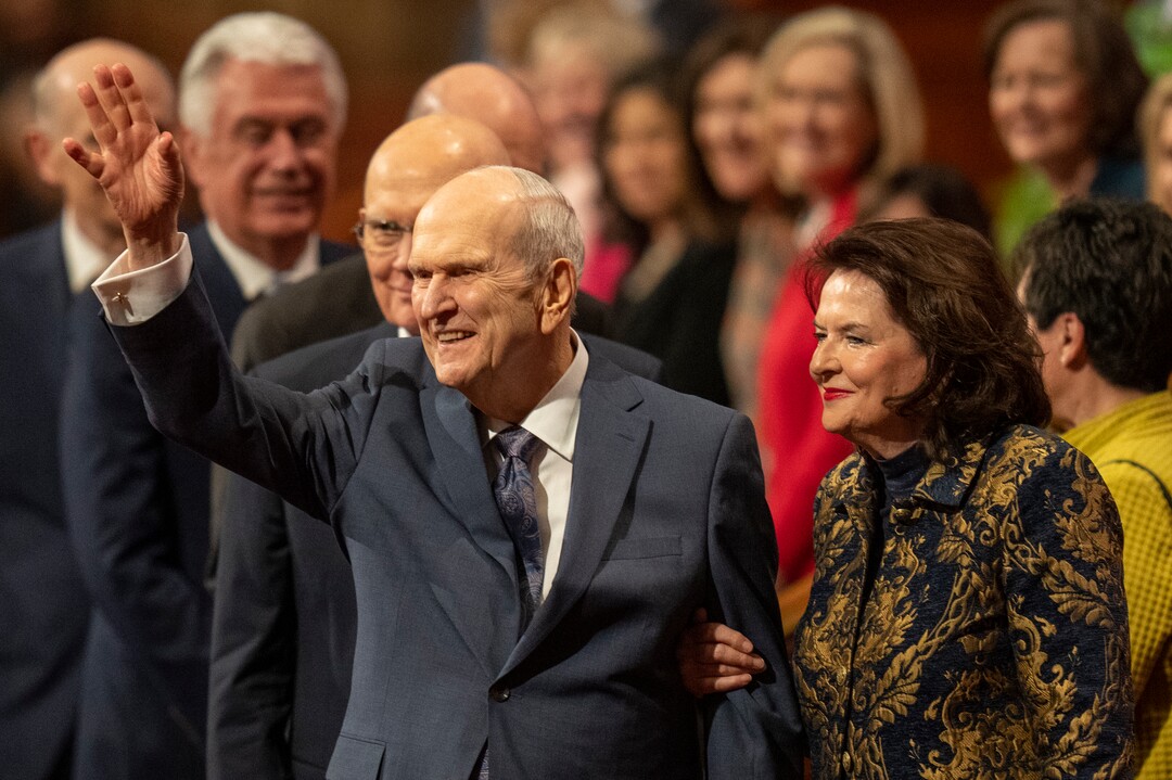 (Rick Egan | The Salt Lake Tribune) President Russel M. Nelson waves to the audience with his wife, Wendy, after the Women's session of LDS General Conference on Saturday, April 2, 2022.
