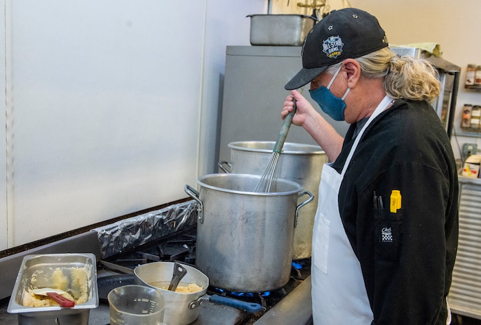 (Rick Egan | The Salt Lake Tribune)  Chris Stathis makes gravy at Cuisine Unlimited, on Wednesday, Nov. 25, 2020.