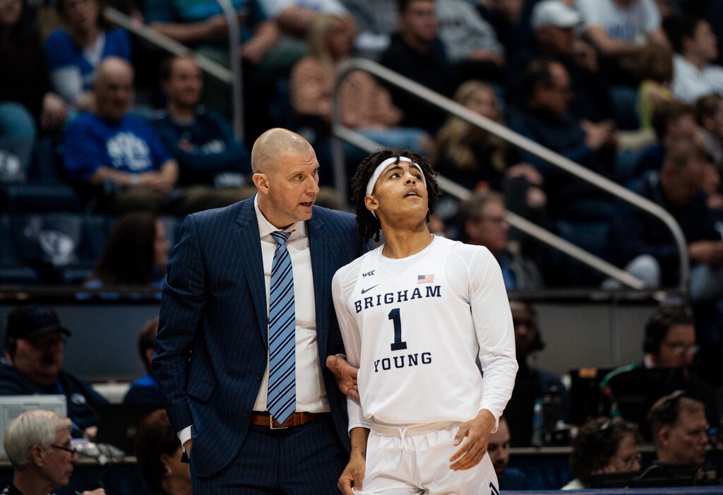(Rachel Rydalch | The Salt Lake Tribune) Brigham Young Cougars head coach Mark Pope, pulls Brigham Young Cougars guard Trey Stewart (1) off to the side during the second period of a NIT game against Long Beach State 49ers at the Marriott Center on Wednesday, March 16, 2022.
