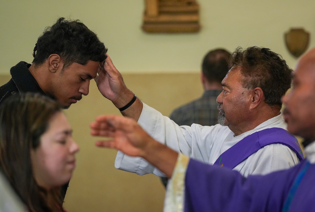 (Chris Samuels | The Salt Lake Tribune) Parishioners receive ashes during Ash Wednesday Mass at St. Patrick’s Catholic Church in Salt Lake City, Wednesday, Feb. 14, 2024.