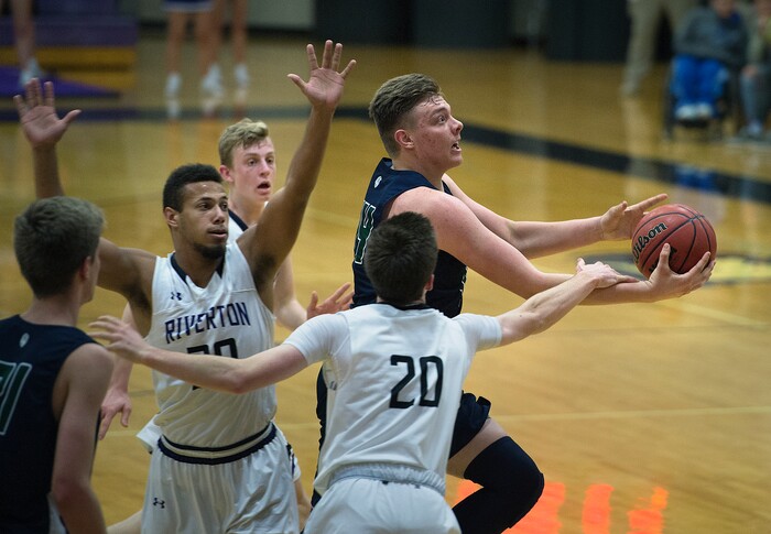 Scott Sommerdorf | The Salt Lake TribuneCopper Hills' Trevon Allfrey is fouled going to the hoop during second half play. Copper Hills defeated Riverton 54-50, Friday, February, 2, 2018. 