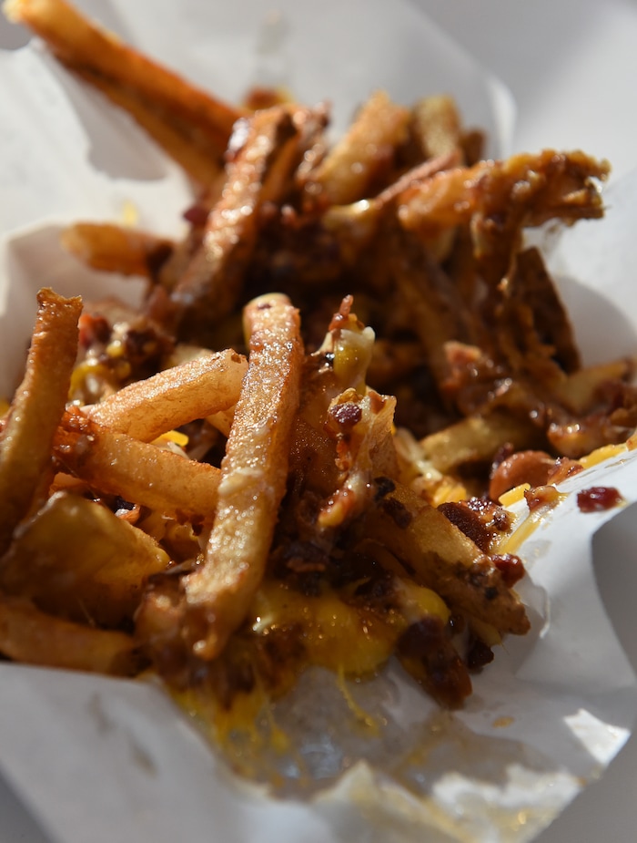 (Francisco Kjolseth | The Salt Lake Tribune) Special Courses, a military-themed restaurant in the dining terrace at The Shops at South Town in Sandy, specializes in burgers and fries including the "Ranger Fries," with cheddar cheese and crumbled bacon. Staff Sgt. James Veylupek, the owner, got help launching the eatery after winning Taste for the Space in May 2017. The veteran, who previously ran the Special Courses food truck, defeated 12 other chefs to get $50,000 and six months free rent in the mallÕs dining terrace.