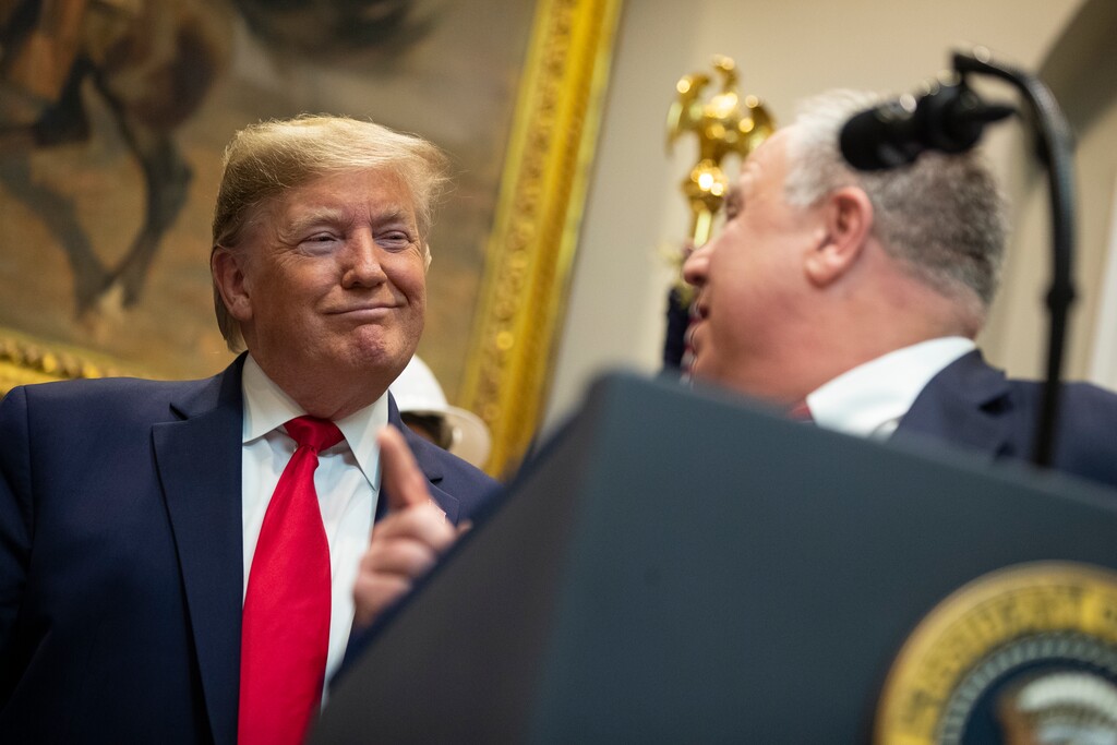 (Evan Vucci | AP Photo) President Donald Trump listens as Secretary of the Interior David Bernhardt speaks on proposed changes to the National Environmental Policy Act, at the White House, Thursday, Jan. 9, 2020, in Washington.