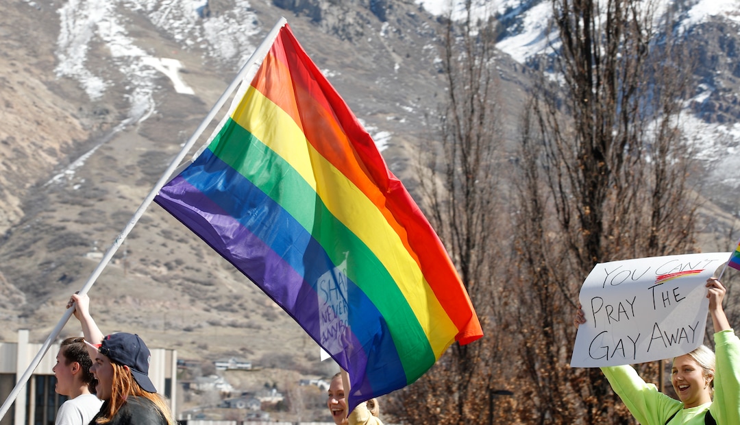 (George Frey  |  special to The Salt Lake Tribune) BYU students and others gather in front of the Ernest L. Wilkinson Student Center on the campus of Brigham Young University to protest BYUÕs rollback of a newly announced policy change on LGBTQ students on March 5, 2020 in Provo, Utah.