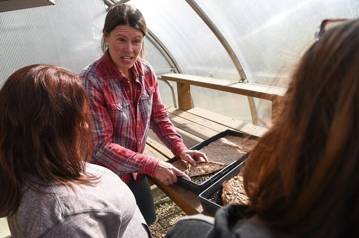 (Francisco Kjolseth  |  The Salt Lake Tribune)  The Center for Women and Children which was forced to close in 2014 when government grants ran out is once again taking women and their children as they go through adult detox programs. Celia Bell, center, a horticulture education specialist who maintained the Freedom Garden across the street, gives women a tour recently and welcomes them to participate and grow fruits and vegetables as part of their rehabilitation. 