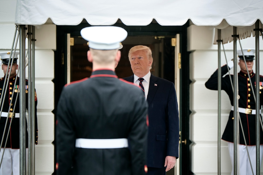 (T.J. Kirkpatrick | The New York Times) President Donald Trump waits at the South Portico of the White House to greet President Sergio Mattarella of Italy, in Washington, Oct. 16, 2019. After vowing not to cooperate with a “kangaroo court,” the president has largely failed to prevent current and former administration members from spending hours with Democrats seeking to impeach him.
