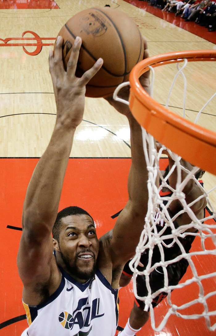 Utah Jazz forward Derrick Favors drives to the basket during the first half in Game 2 of an NBA basketball second-round playoff series against the Houston Rockets, Wednesday, May 2, 2018, in Houston. (AP Photo/Eric Christian Smith)