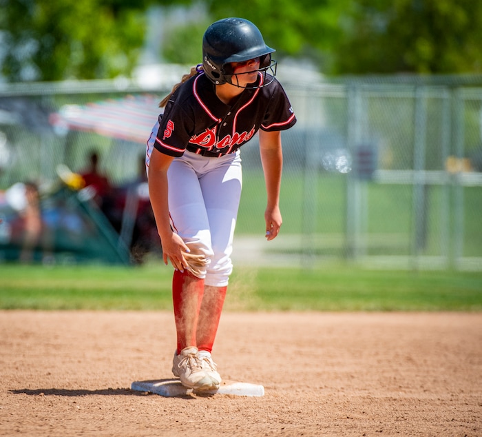 (Isaac Hale | Special to The Tribune) Spanish Fork outfielder Emmie Olson (15) dusts off her pants after stealing second base during the second game of a best-of-three series between the Spanish Fork Lady Dons and the Mountain Ridge Sentinels as part of the 5A state softball championship held at the Spanish Fork Sports Park on Friday, May 28, 2021.