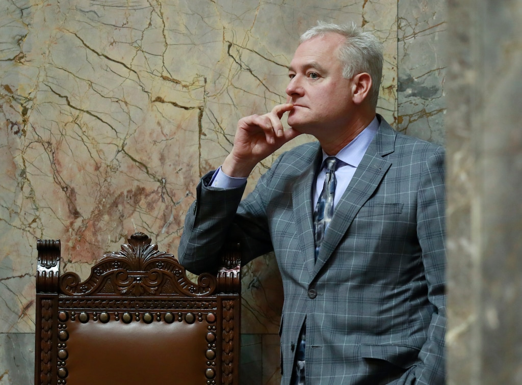 (AP Photo/Ted S. Warren) Sen. Reuven Carlyle, D-Seattle, listens as he stands on the Senate floor Friday, Feb. 15, 2019, during debate in Olympia, Wash., on a measure sponsored by Carlyle that would repeal the death penalty in Washington state. The Senate on Friday approved the measure, which will now head to the House, just months after the state's Supreme Court unanimously struck down capital punishment as arbitrary and racially biased.