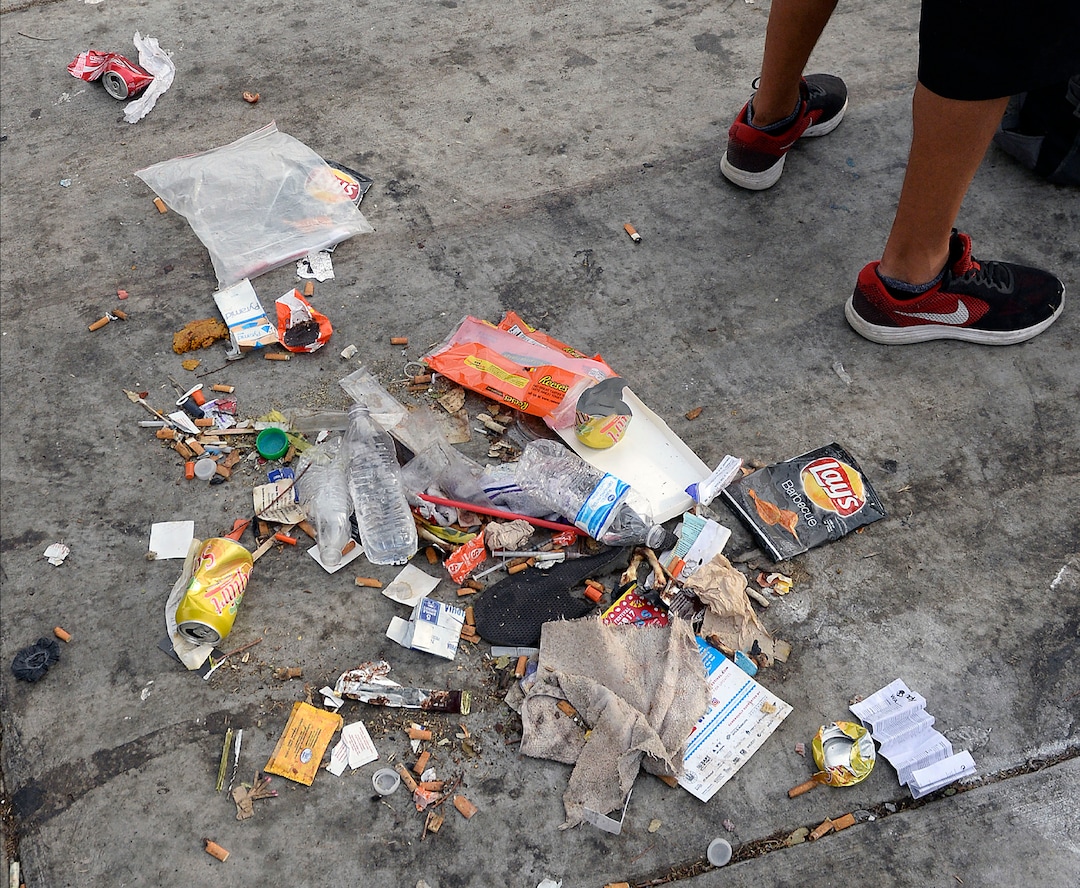 Al Hartmann  |  The Salt Lake TribuneGarbage on the sidewalk near 200 S. and 500 W. Wedesday July 19.  Homeless people sleep and camp out there by the dozens. 