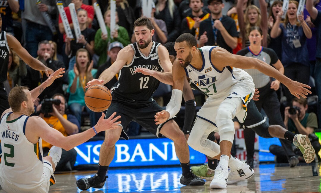 (Rick Egan  |  The Salt Lake Tribune)        Utah Jazz forward Joe Ingles (2) grabs a loose ball with 3.8 seconds left in the game, as Brooklyn Nets forward Joe Harris (12) and Utah Jazz center Rudy Gobert (27) look on, in NBA basketball action between the Utah Jazz and the Brooklyn Nets in Salt Lake City, Tuesday, Nov 12, 2019.