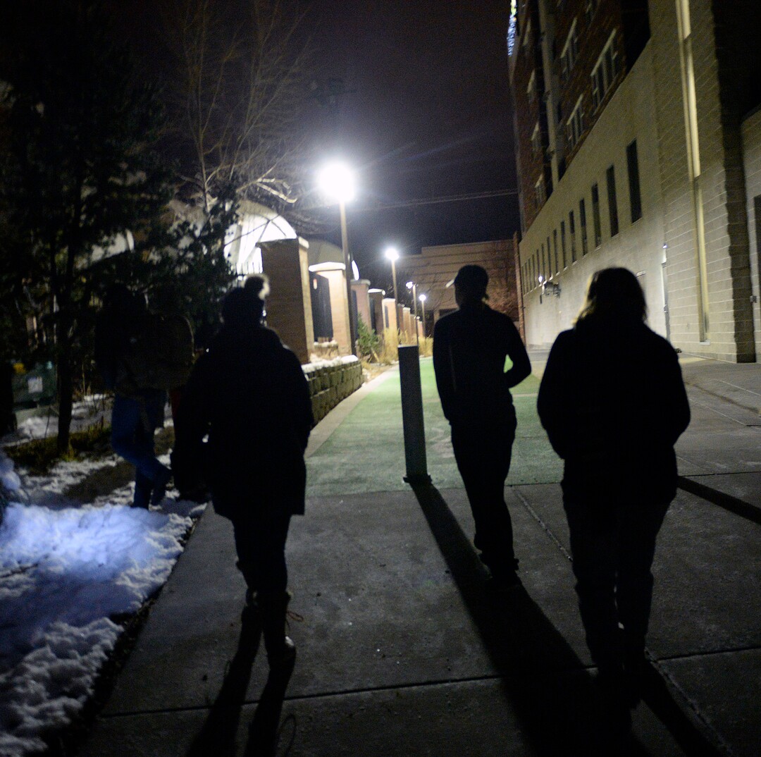 (Al Hartmann  |  The Salt Lake Tribune)  Volunteers walk through a neighborhood near Hidden Hollow in Sugar House at 4:20 a.m Thursday, Jan. 25, 2018, looking for homeless campers as part of the annual Point In Time survey.