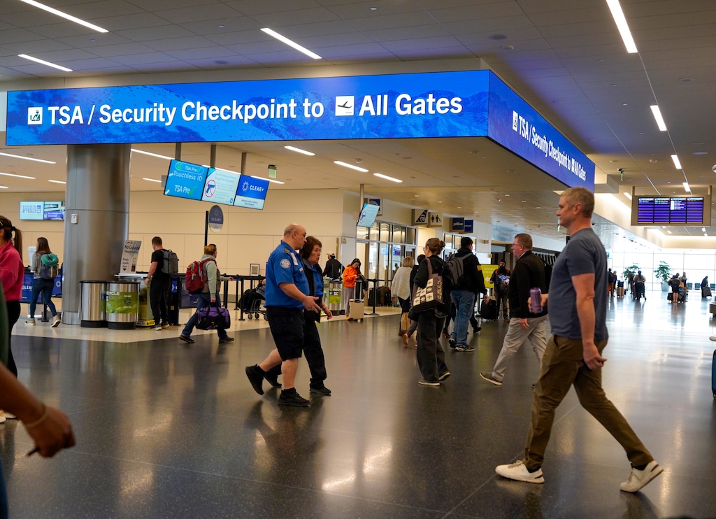 (Chris Samuels | The Salt Lake Tribune) Passengers walk by security screening at Salt Lake City International Airport, Monday, March 23, 2026.