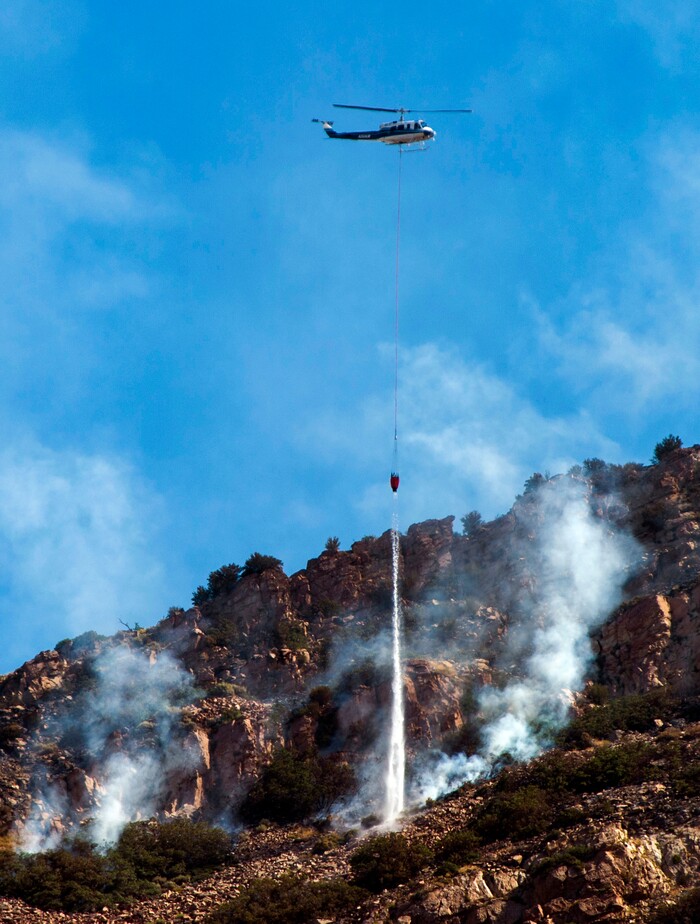 (Rick Egan  |  The Salt Lake Tribune) Crews battle the Green Ravine fire as it continues to burn near Tooele, Wednesday, Sept. 4, 2019.