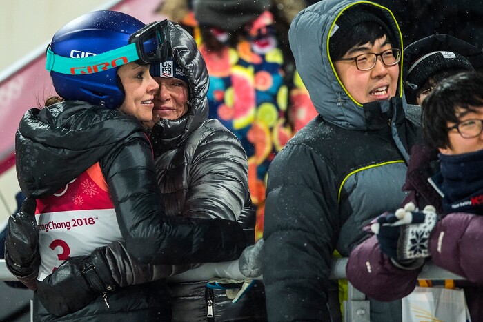 (Chris Detrick  |  The Salt Lake Tribune)  USA's Sarah Hendrickson hugs her mom Nancy Hanson after competing in the Ladies' Normal Hill Individual at the Alpensia Ski Jumping during the Pyeongchang 2018 Winter Olympics Monday, February 12, 2018.  Hendrickson finished in 19th place with a total of 160.6.