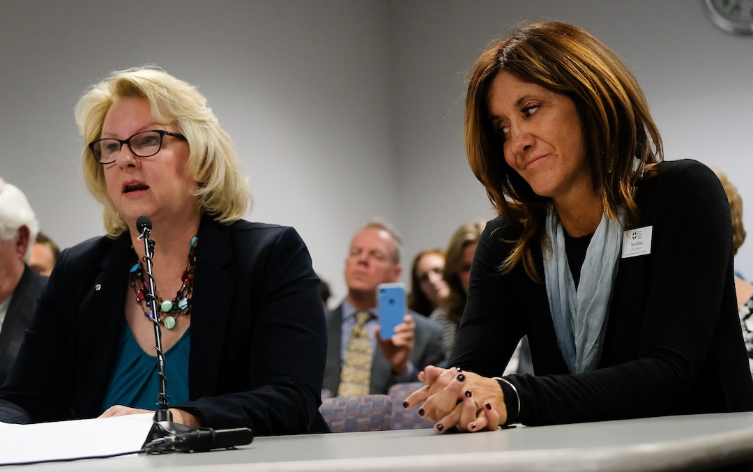 (Francisco Kjolseth  |  The Salt Lake Tribune)  Merrilee Boyack of Family Watch International, left, says the proposed rule to ban conversion therapy is over-board and would have a chilling effect on talk therapy. "This rule removes choice for teens and children, their parents and families." Taryn Hiatt with the American Foundation for Suicide Prevention, at right, says conversion therapy can invoke feelings of guilt and shame and can lead to depression, substance abuse and suicides as they attend a public hearing on a conversion therapy ban in Salt Lake City on Thursday, Sept. 26, 2019.