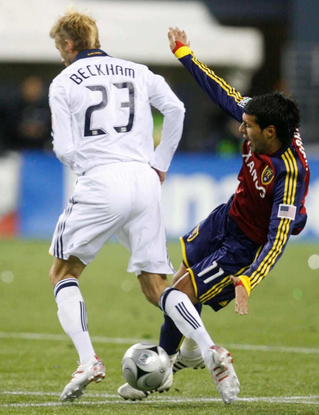 (Trent Nelson  |  Tribune file photo) Real Salt Lake midfielder Javier Morales (11) collides with LA's David Beckham during the MLS Cup Sunday, November 22 2009 at Qwest Field in Seattle.