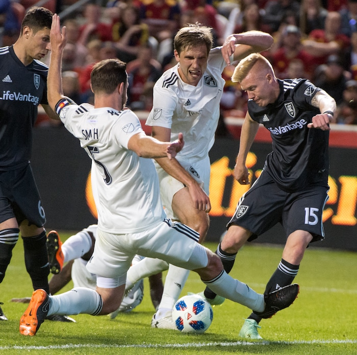 (Rick Egan  |  The Salt Lake Tribune) 
Real Salt Lake defender Justen Glad (15) tries to get the ball past Colorado Rapids defender Tommy Smith (5), in MLS soccer action, between Real Salt Lake and Colorado Rapids,  at Rio Tinto Stadium, Saturday, April 21, 2018.


