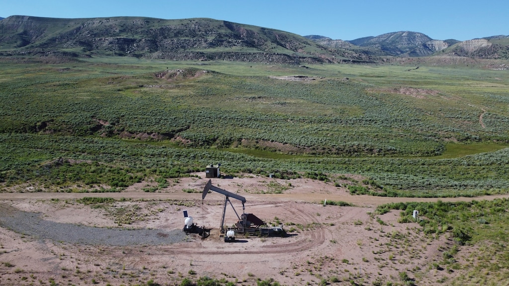 (Rick Bowmer | Associated Press) A pumpjack dips its head to extract oil in a basin north of Helper in 2023. Utah's Republican representatives in Washington, D.C. want to pass legislation that will block a recent Bureau of Land Management rule from going into effect, which they say threatens to curb profitable commercial uses of public lands, like oil production.