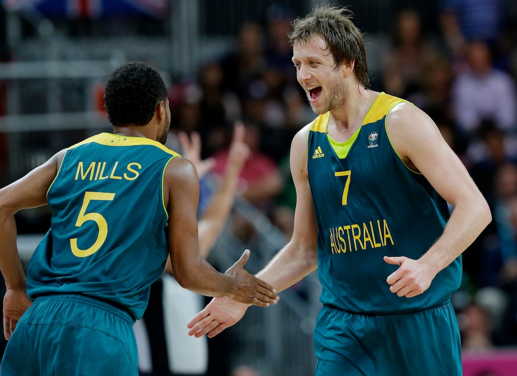 Australia's Joe Ingles (7) celebrates with teammate Patrick Mills (5) during a preliminary men's basketball game against Great Britain at the 2012 Summer Olympics, Saturday, Aug. 4, 2012, in London. (AP Photo/Eric Gay)