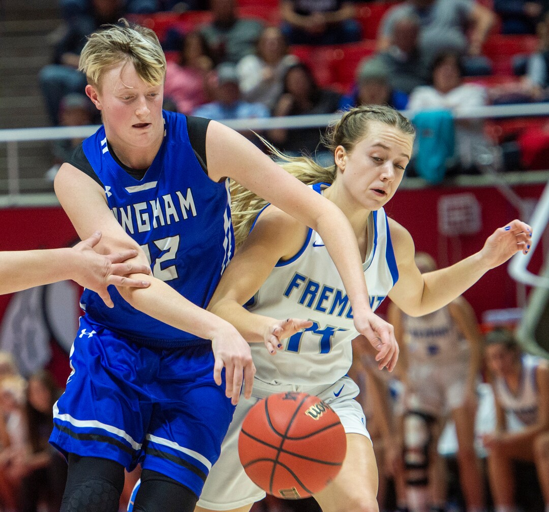 (Rick Egan  |  The Salt Lake Tribune)     Bingham Miners Madison Jones (22) goes for the ball, along with Fremont Sliverwolves Daycee Townsend (14), in the 6A championship game, between the Fremont Sliverwolves and the Bingham Miners, at the Jon M. Huntsman Center, Saturday Feb. 29, 2020