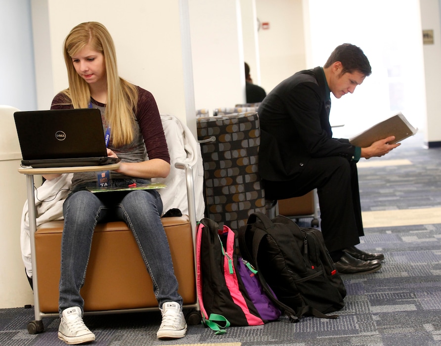 (Tribune file photo) Kaylene Finch, general study major, left, and Geoff Canaan, who is undecided in his major study in a lounge in the classroom building at Snow College in this 2013 photo.