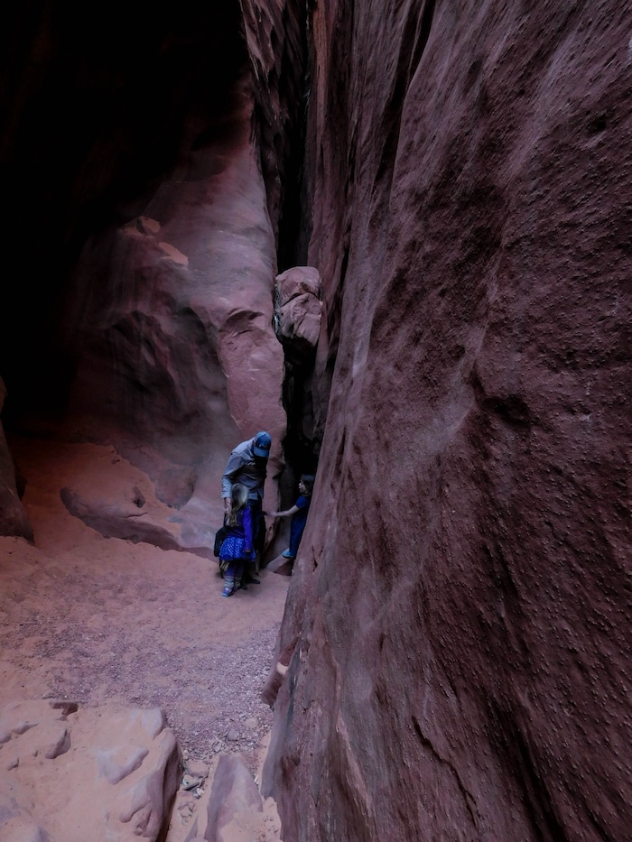 (Erin Alberty|The Salt Lake Tribune) Children work up the nerve to enter a dark section of Leprechaun Canyon on April 29, 2017.
