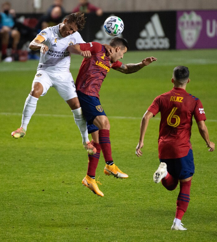(Francisco Kjolseth  |  The Salt Lake Tribune) Los Angeles Galaxy midfielder Jonathan dos Santos (8) battles Real Salt Lake defender Aaron Herrera (22) as Real Salt Lake hosts L.A. Galaxy at Rio Tinto Stadium in Sandy on Wednesday, Sept. 23, 2020.