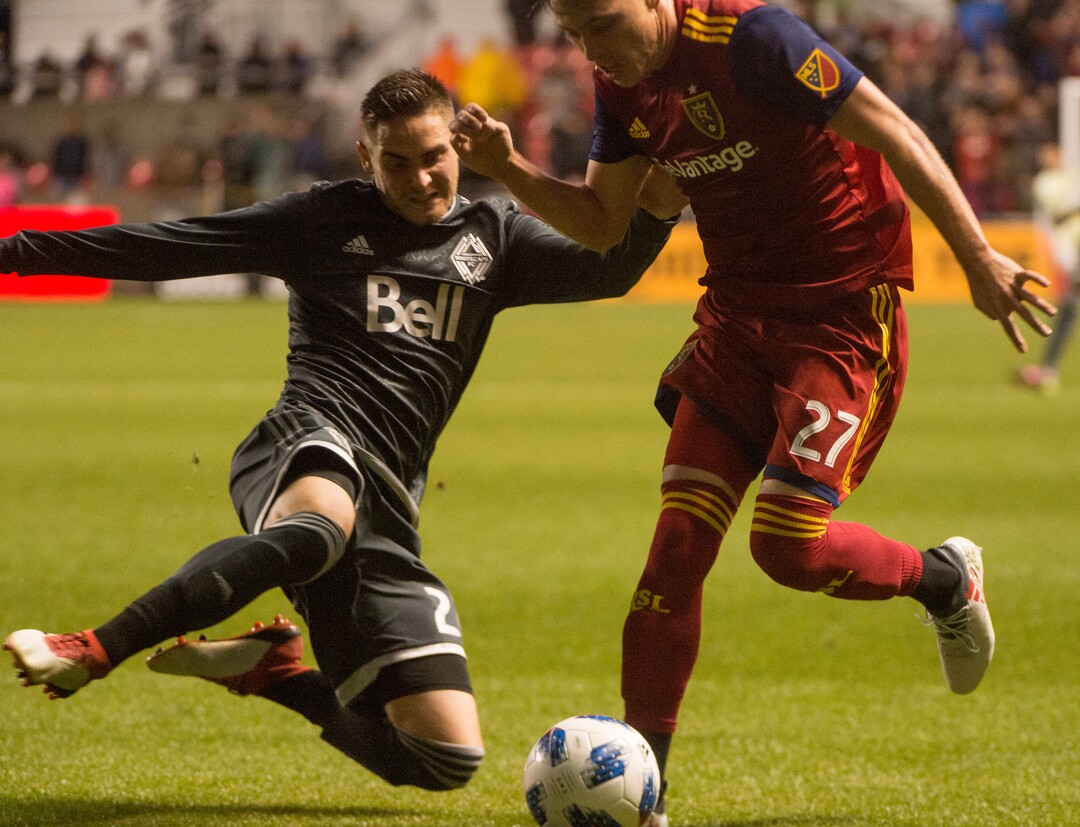 (Rick Egan  |  The Salt Lake Tribune)      Vancouver Whitecaps defender Jake Nerwinski (28) goes for the ball along with Real Salt Lake forward Corey Baird (27), in MLS action between Real Salt Lake and Vancouver Whitecaps, at Rio Tinto Stadium beSaturday, April 7, 2018.