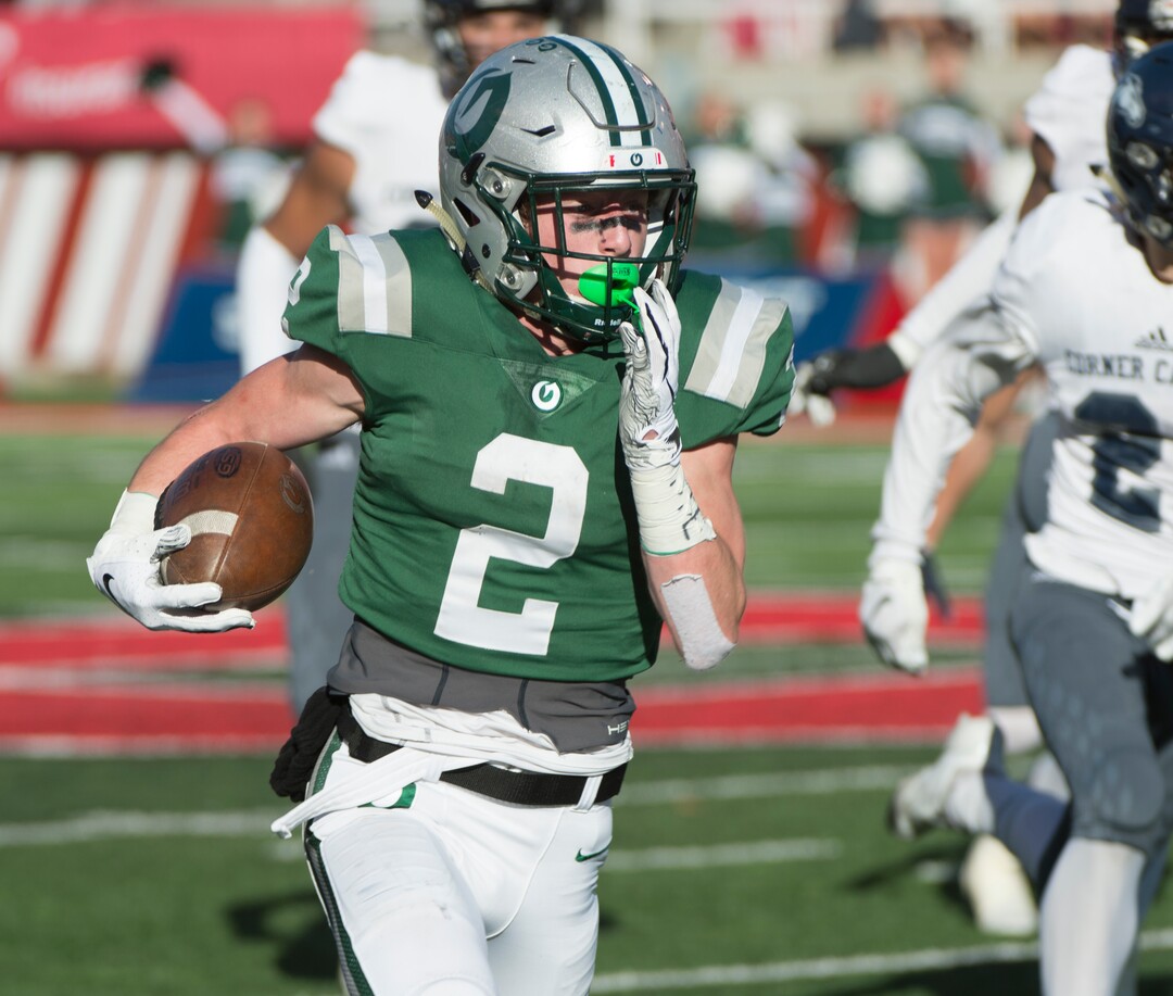 (Rick Egan  |  The Salt Lake Tribune)    Olympus running back Tommy Poulton (2), run for a Titan touchdown, in 5A football semifinal action between Olympus and Corner Canyon at Rice-Eccles Stadium, Thursday, Nov. 8, 2018.