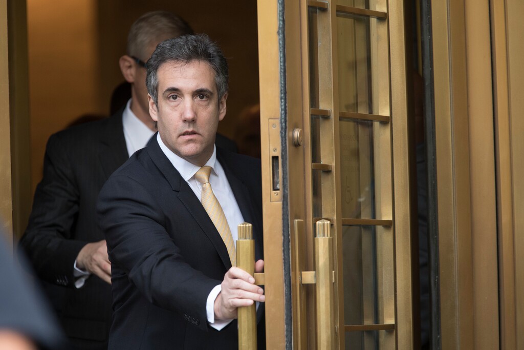 (Mary Altaffer | The Associated Press) Michael Cohen leaves Federal court, Tuesday, Aug. 21, 2018, in New York. Cohen, has pleaded guilty to charges including campaign finance fraud stemming from hush money payments to porn actress Stormy Daniels and ex-Playboy model Karen McDougal.