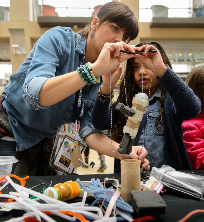 (Trent Nelson | The Salt Lake Tribune)  Beth Kerr and Maya Perez create a marionette at the Tumbleweeds Film Festival  in Salt Lake City, Saturday March 3, 2018.