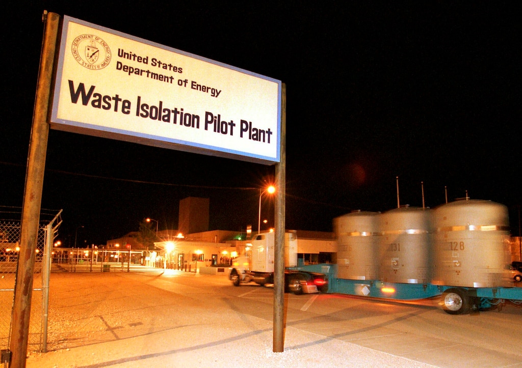 (AP File Photo |Thomas Herbert) In this file photo from March 26, 1999, the first load of nuclear waste arrives at the Waste Isolation Pilot Plant in Carlsbad, N.M., from the Los Alamos National Laboratory. Twenty years and more than 12,380 shipments later, tons of Cold War-era waste from decades of bomb-making and nuclear research across the U.S. have been stashed in the salt caverns that make up the underground facility.