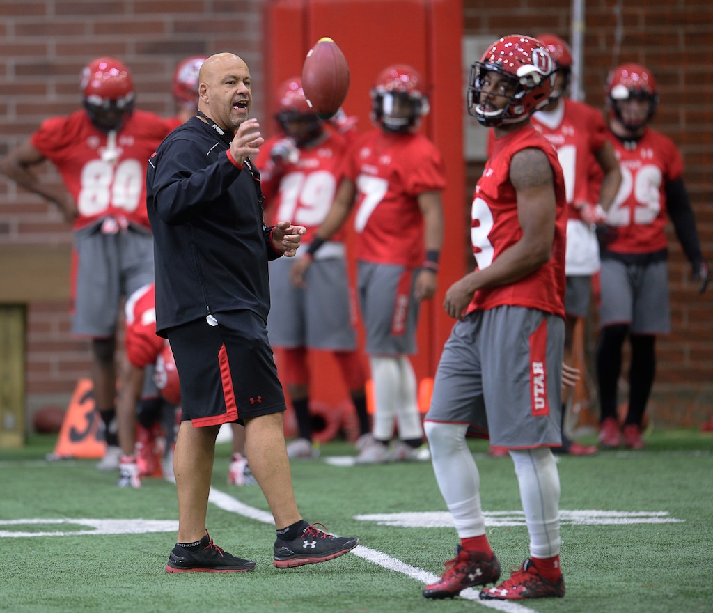 Francisco Kjolseth | The Salt Lake TribuneUniversity of Utah wide receiver coach Guy Holliday encourages his the team running drills as the team kicks off opening day of spring practice on Tuesday, March 22, 2016.