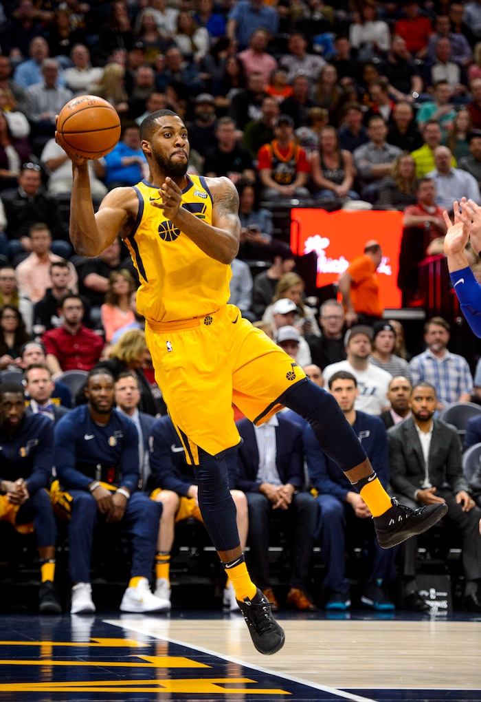 (Steve Griffin  |  The Salt Lake Tribune)  Utah Jazz forward Derrick Favors (15) saves the ball from going out of bounds during the Utah Jazz versus Detroit Pistons at Vivint Smart Home Arena in Salt Lake City Tuesday March 13, 2018.