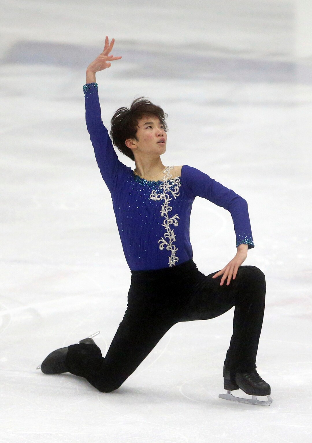 Japan's Kazuki Tomono competes during in the men's short program at the U.S. International Figure Skating Classic in Salt Lake City, Thursday, Sept. 14, 2017. (AP Photo/Rick Bowmer)