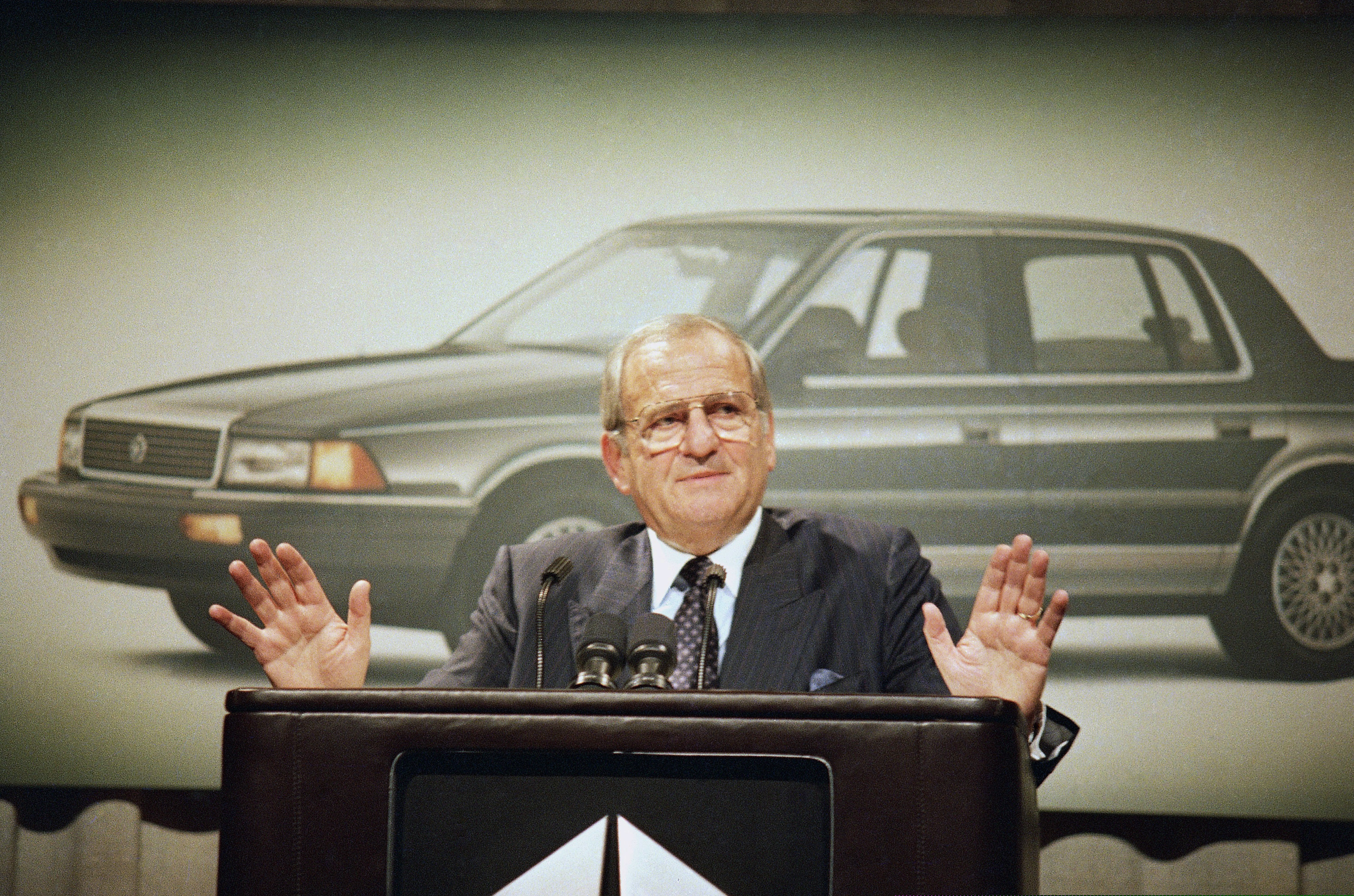 (Mario Cabrera | AP file photo)
Chrysler Corp. Chairman Lee Iacocca speaks about 1989 fourth quarter pre-tax earnings for the automaker at Grand Hyatt Hotel, New York. Former Chrysler CEO Iacocca, who became a folk hero for rescuing the company in the '80s, has died. He was 94.