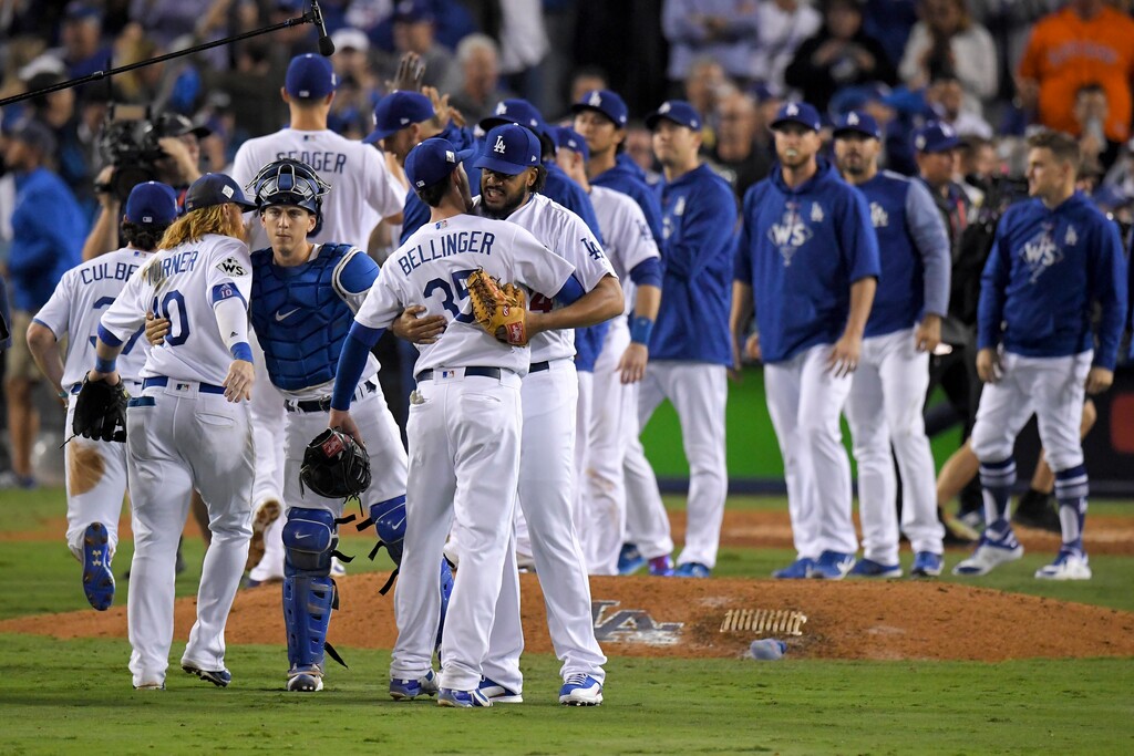 The Los Angeles Dodgers celebrate after their win against the Houston Astros in Game 6 of baseball's World Series Tuesday, Oct. 31, 2017, in Los Angeles. The Dodgers won 3-1 to tie the series at 3-3.(AP Photo/Mark J. Terrill)