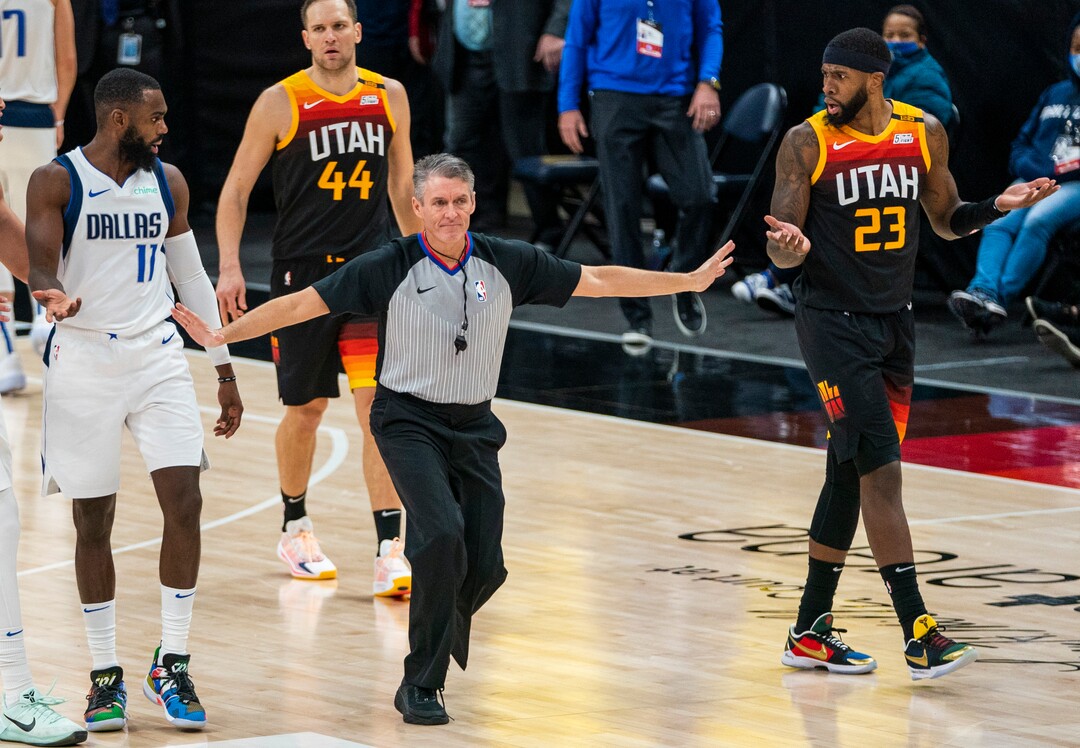 (Rick Egan | The Salt Lake Tribune) Referee Scott Foster (48) seperates Dallas Mavericks forward Tim Hardaway Jr. (11) and Utah Jazz forward Royce O'Neale (23) from each other after Hardaway was called for a foul, in NBA action between the Utah Jazz and the Dallas Mavericks at Vivint Arena, on Friday, Jan. 29, 2021.