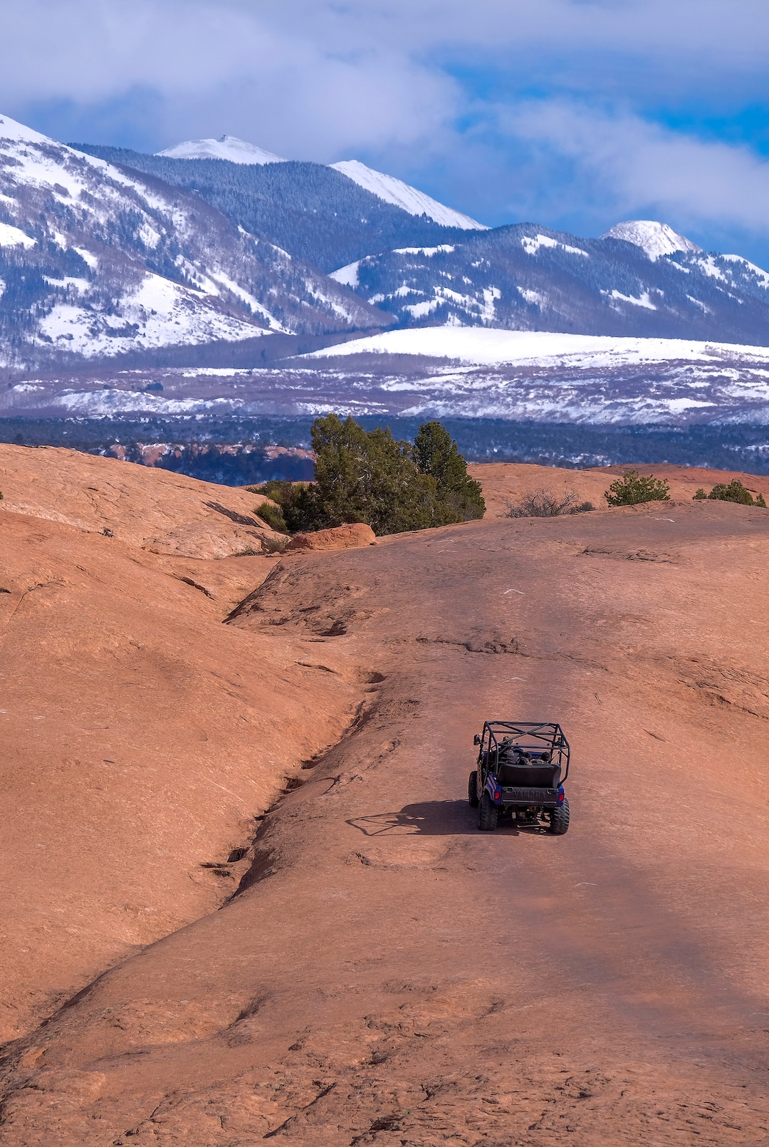 (Leah Hogsten | The Salt Lake Tribune) An off-road utility terrain vehicle (UTV) eases up Fins & Things 4x4 Trail at the Sand Flats Recreation Area trail, located just 4 miles from downtown Moab, Feb. 19, 2021.